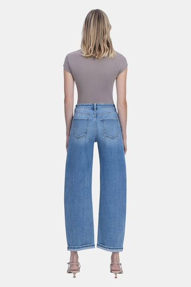 SaltTree Flying Monkey high rise medium wash barrel leg jeans with a 1" cuff, made from a cotton-lyocell blend.