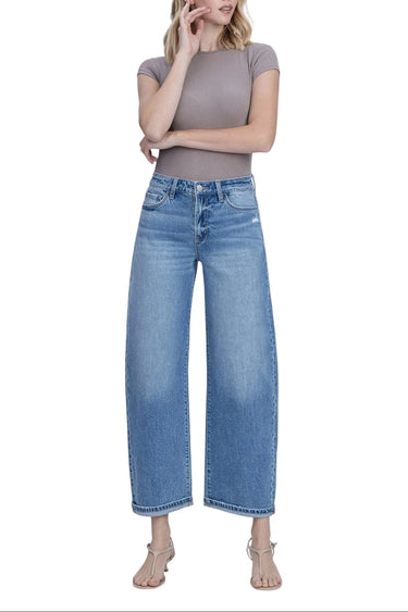 SaltTree medium wash high rise barrel leg jeans with a 1" cuff in a cotton-lyocell blend.