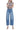 SaltTree medium wash high rise barrel leg jeans with a 1" cuff in a cotton-lyocell blend.