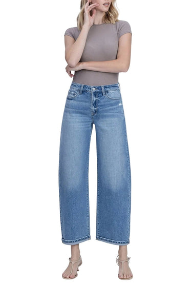 SaltTree medium wash high rise barrel leg jeans with a 1" cuff in a cotton-lyocell blend.