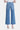 SaltTree Flying Monkey medium wash high rise slim wide leg cropped jeans with raw hem and light distressing.
