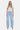 SaltTree Flying Monkey light wash denim barrel leg jeans with a super high rise and full length finished hem.
