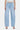 SaltTree light wash blue denim jeans with a super high rise, long barrel leg, and finished hem. Crafted from comfort stretch denim.