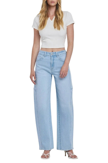SaltTree light wash denim jeans with a super high rise, long barrel leg, and finished hem. Model wears size 3/26.