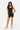 Love Poem fitted active romper onesie in black on a model