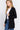 SaltTree model wearing a black Active Basic open front cardigan with rib banded trim and front pockets over a white tee
