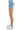 SaltTree American Bazi light blue denim cargo shorts with pearl embellishments on pockets, side view on model