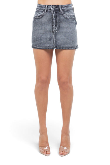 SaltTree American Bazi black wash mini denim skirt with rhinestone trim and button closure on a model