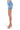 SaltTree American Bazi light blue denim mini skirt with rhinestone trim, side view on model wearing clear heels