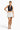 SaltTree ANWND black halter crop top with shirred bust and wide ribbed waistband worn by a model with a white skirt