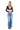 SaltTree model wearing a black ANWND long sleeve ribbed V-neck crop top with light wash wide-leg denim jeans