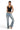 SaltTree ANWND black ribbed cropped camisole with low V-neck and adjustable straps worn by a model in light jeans