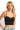 SaltTree ANWND black seamless bustier crop top worn by a blonde model with a sweetheart neckline and thin straps