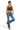 SaltTree ANWND brown halter neck hanky top worn by a model with blue jeans and heels against a white background