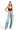 SaltTree model wearing an ANWND brown seamless deep V-neck crop bralette with adjustable straps and light blue jeans