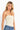 SaltTree model wearing a cream ANWND strapless seamless tube top bodysuit with a smooth body-hugging fit.
