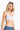 SaltTree ANWND white ribbed V-neck cami bra top worn by a blonde model against a plain white background