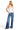 SaltTree ANWND white double-layered ribbed knit cami top with square neckline and thin straps worn with blue jeans