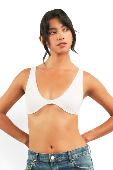 SaltTree ANWND white scoop neck bralette with front hook closure and wide straps worn by a model
