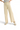 SaltTree high-rise wide-leg crop pants in beige stretch twill with a raw hem, worn with sneakers.