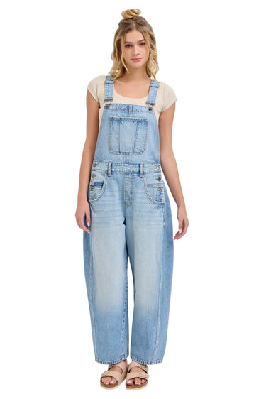 SaltTree model wearing Cello Jeans light wash denim barrel leg overalls with square neck and racerback straps