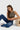 SaltTree model wearing Cello Jeans super high rise medium wash dad jeans with a relaxed straight leg fit