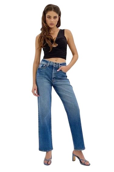 SaltTree model wearing Cello Jeans super high rise medium wash dad jeans with a straight leg and 31-inch inseam