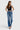 SaltTree model wearing Cello Jeans super high rise medium wash dad jeans with a relaxed straight leg fit.