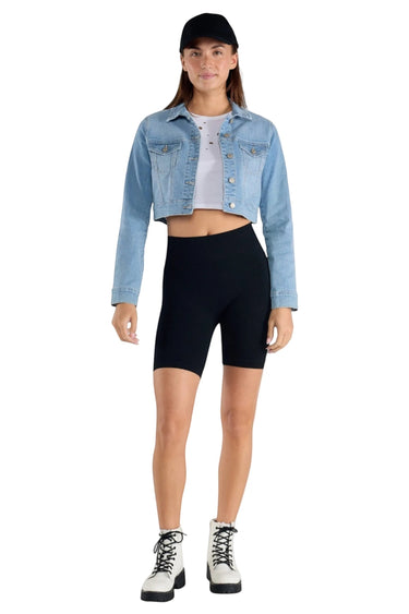 SaltTree model wearing an Enjean stone wash cropped denim jacket with a white crop top and black biker shorts