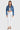 SaltTree Enjean cropped denim jacket with destructed details and stone wash worn by a model with white jeans