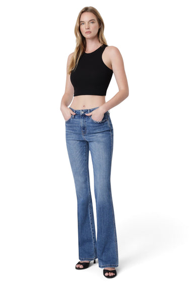SaltTree model wearing Flying Monkey high rise bootcut jeans in medium blue wash with center front seams and raw hem