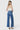 SaltTree Flying Monkey high rise wide leg jeans in medium wash with trouser crease, worn by a model from behind.