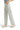 SaltTree high rise wide leg crop pants in light blue stretch twill with a raw hem, worn with white sneakers.