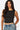 SaltTree model wearing a black Love Poem sleeveless boatneck top in smoothing double-layer jersey fabric