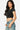 SaltTree Love Poem black double-layered crew neck cropped t-shirt on a model wearing blue jeans