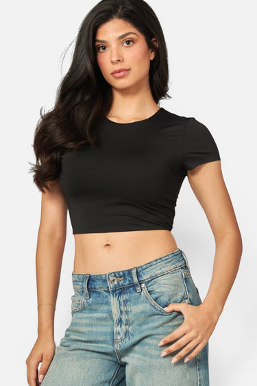 SaltTree Love Poem black double-layered cropped crew neck t-shirt worn by a model with blue jeans