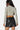 SaltTree Love Poem black faux leather mini skort worn by a model from the back view