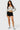 SaltTree model wearing black Love Poem lace bloomer shorts with ruffle frills and a decorative bow