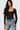 SaltTree Love Poem black long sleeve scoop neck bodysuit on a model wearing blue denim jeans