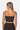 SaltTree Love Poem black ribbed seamless tube top worn by a model, back view showing fitted strapless design.