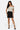SaltTree Love Poem black scuba mini skirt with side slit and faux-leather belt worn by a model with an off-shoulder top