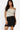 SaltTree Love Poem black scuba mini skirt with side slit and slim faux-leather belt worn by a model