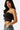 SaltTree Love Poem black strapless tube top in smoothing double-layer contour fabric worn by a model
