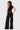 SaltTree Love Poem black waffle-knit two-piece set featuring a cropped vest and high-waisted wide-leg trousers