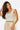 SaltTree Love Poem white seamless cap sleeve tank top with a scoop neckline worn by a model.