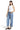 SaltTree model wearing Mica Denim high-rise barrel-leg jeans in vintage medium wash with a cuffed hem.