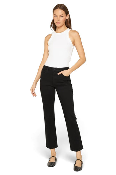Model wearing SaltTree Mica Denim mid-rise ankle straight jeans in solid black with a white tank top and flats.