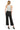 SaltTree Mica Denim high rise wide leg cropped black jeans on a model, back view with a grey tank top and heels.