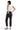 SaltTree Mica Denim high rise charcoal jogger cropped pants on a model wearing a white tank top and sneakers
