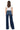 SaltTree mica denim super high rise dark indigo wide leg skater jeans with a 34 inch inseam on a model, back view.